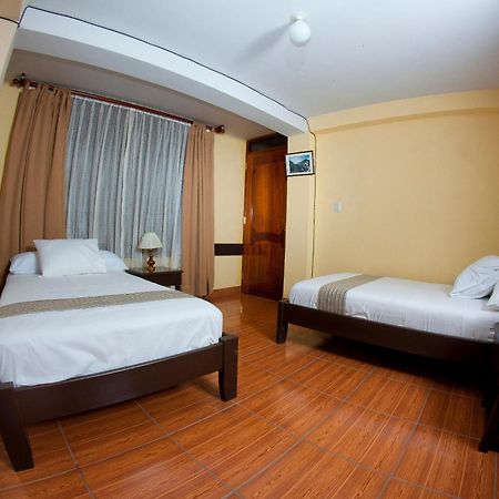 Yucay Plaza Inn Værelse billede